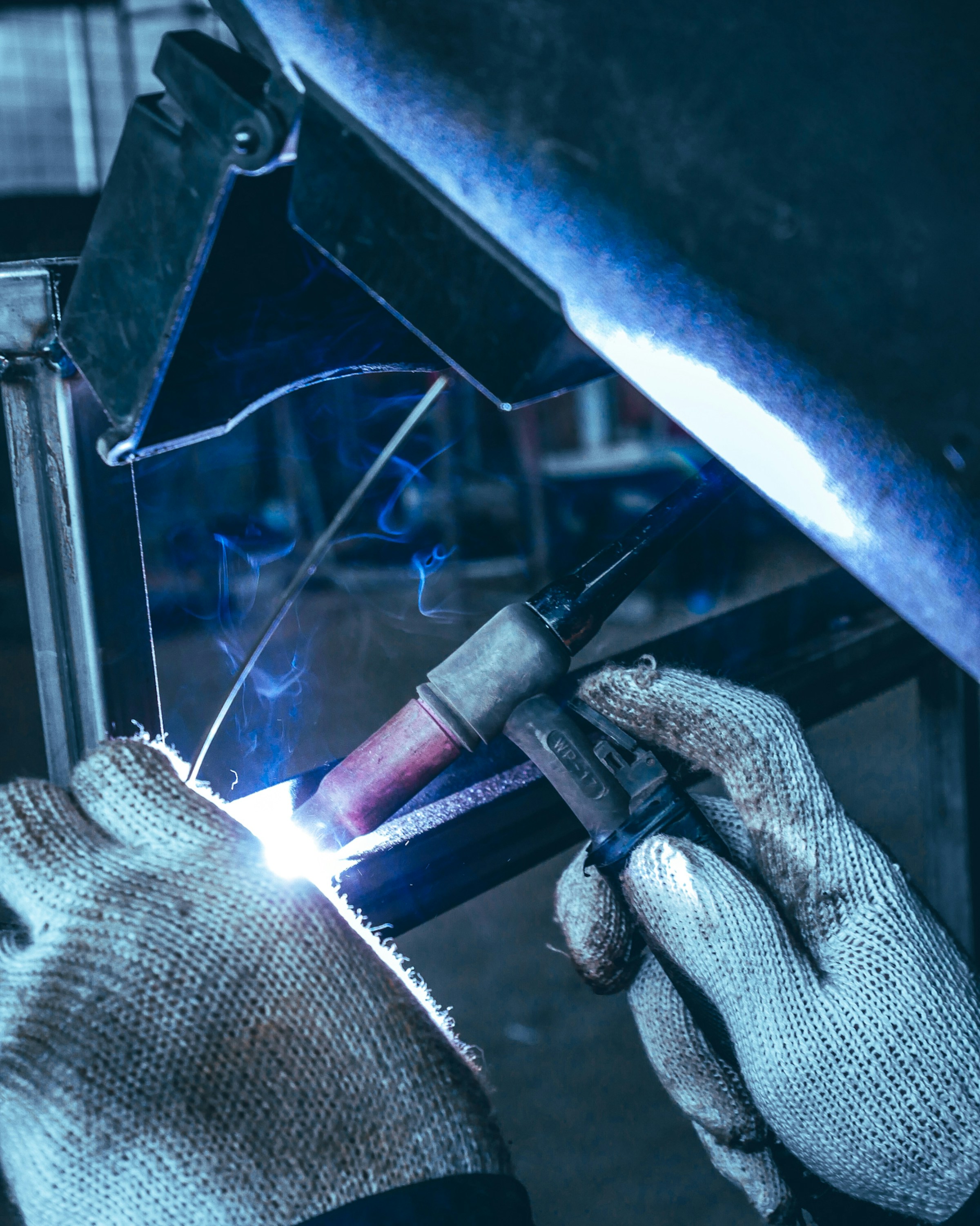 Welder performing skilled commercial work